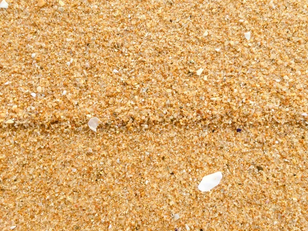 Streszczenie naturalnej piaszczystej plaży zbliżenie, seacoast tła. Miejsca na powierzchni tekstu — Zdjęcie stockowe
