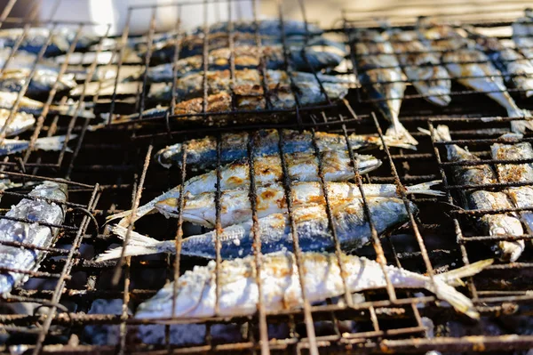 Closeup on fish in a grill — Stock Image Closeup on fish in a grill Stock Photo
