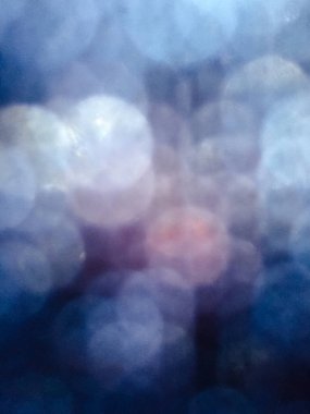 Mavi parlak renkli ışık bokeh arka plan