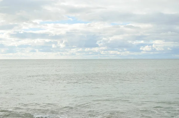 Amazing sunset beach blurry natural cloudy sky outdoors background — Stock Photo, Image