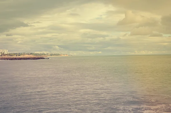 Amazing sunset beach blurry natural cloudy sky outdoors background — Stock Photo, Image