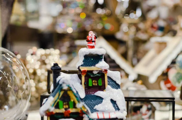 Decorated Christmas children shopping toys on joyful festive shiny blurred light background, closeup image. Seasonal elegant natural classy mood, love peace jolly decor design, traditional bright joy — Stock Photo, Image