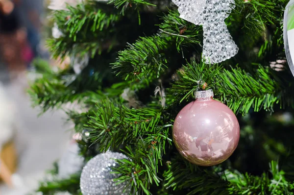 Decorated Christmas tree on joyful festive shiny blurred background, closeup image. Seasonal traditional bright joy, elegant natural classy mood, love and peace jolly design — Stock Photo, Image