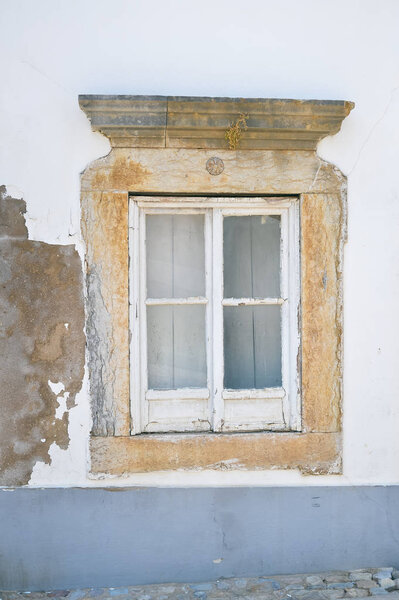 Old window on retro wall background