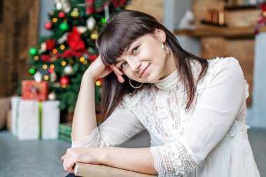 Evinde kitabın bir kız. Kavram mutlu Noeller, konfor, kablosuz