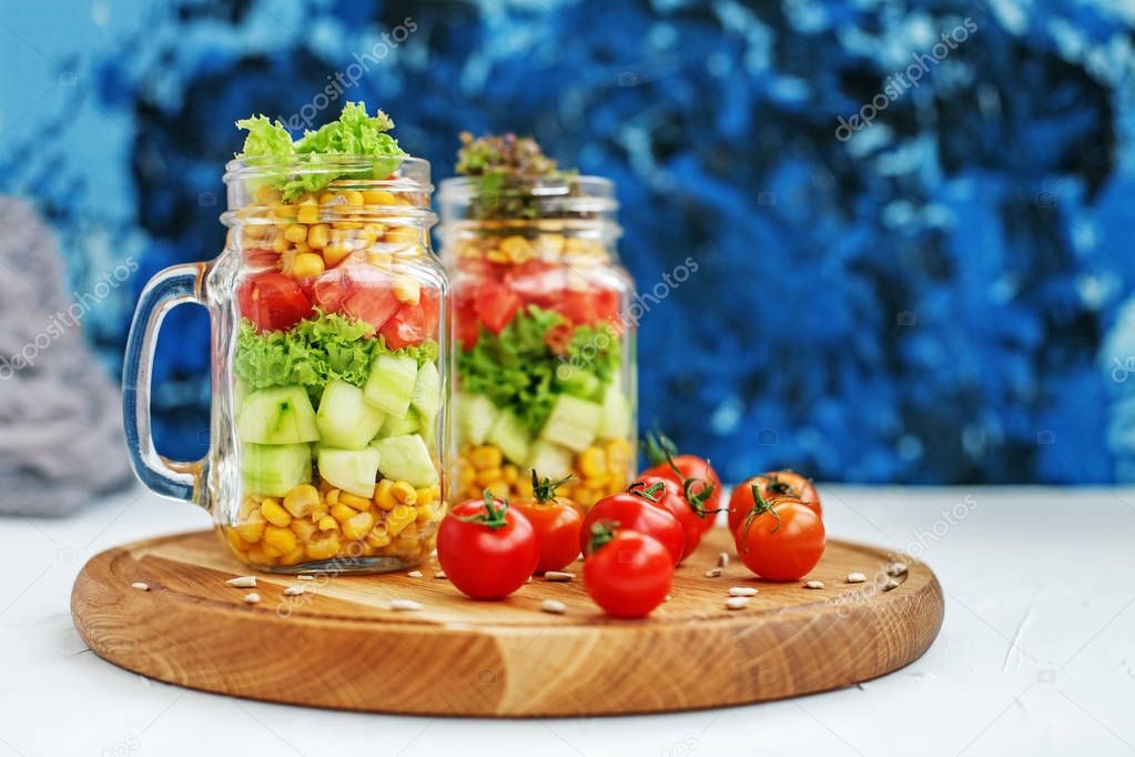 Vegetable healthy salad in a glass jar. Light breakfast. 