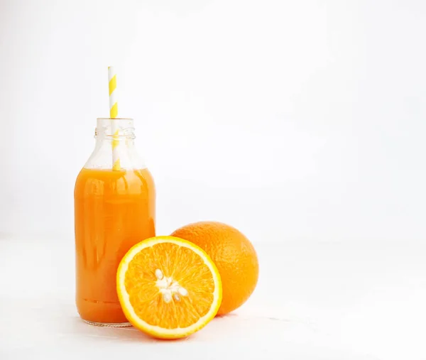 Orange juice in a bottle. The concept of beverages, health food — Stock Photo, Image