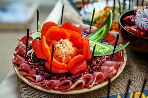 Pieces of salami on a plate. The concept of food. — Stock Photo, Image