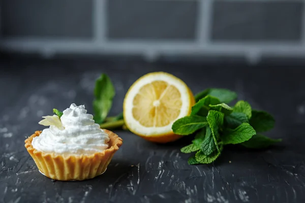 Sweet tasty cake, mint and lemon. The concept of food, desserts,