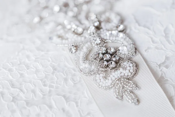 Beautiful details of a wedding dress — Stock Photo, Image