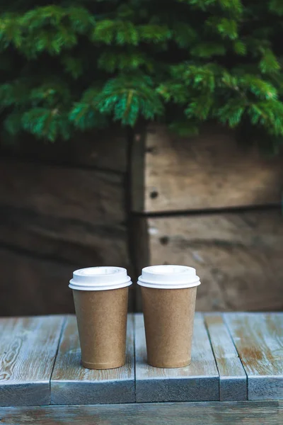 Coffee to go on vintage table — Stock Photo, Image