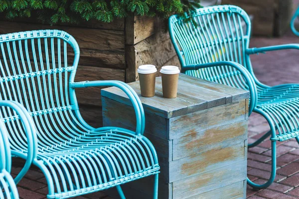 Coffee to go on vintage table — Stock Photo, Image