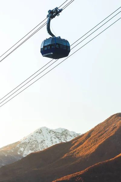 Modern cableway in mountains Stock Photo