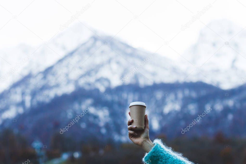 Girl holding cup of beverage