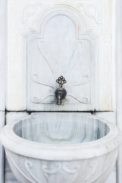 Old street washbasin with a few taps — Stock Photo, Image