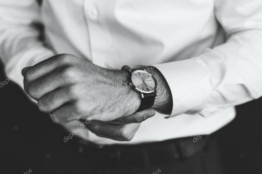 Man wearing watches.