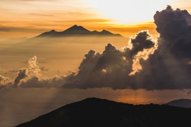 Rinjani peak in Bali at sunrise clipart