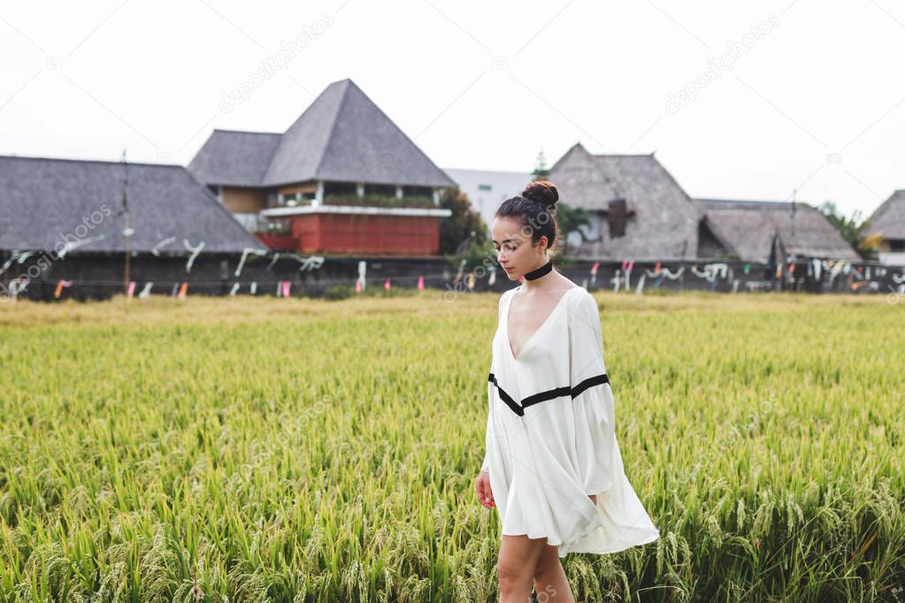 Young woman in rice field