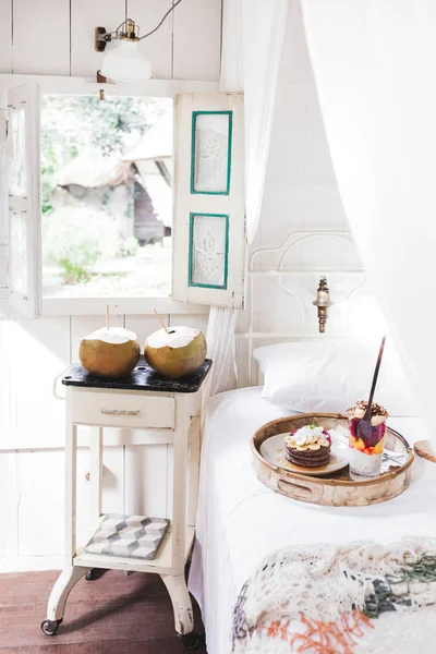 Fresh tasty breakfast in bed — Stock Photo, Image