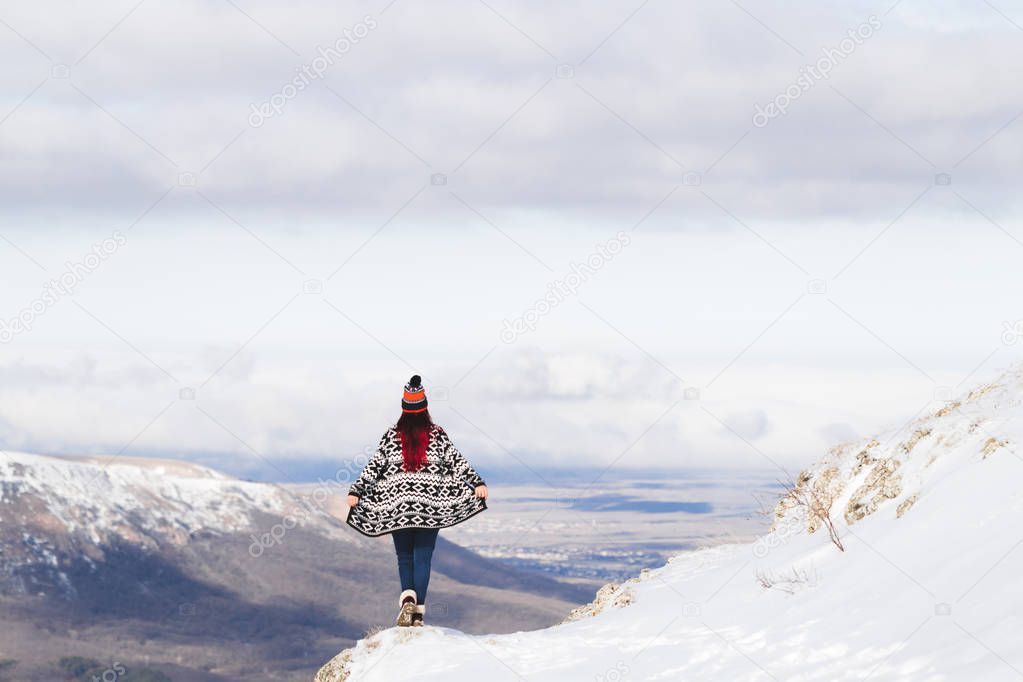 Woman a mountain panorama