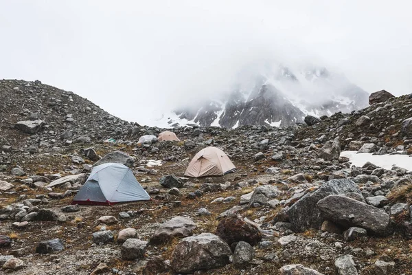 camping with tents in winter mountains