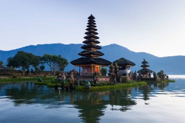 Pura Ulu Danau Bratan Temple in Bali at dawn clipart