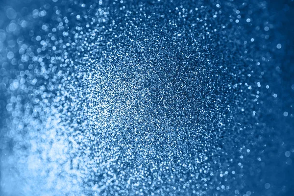 Fond bleu avec paillettes. Brillant éclat flou textur bokeh — Photo