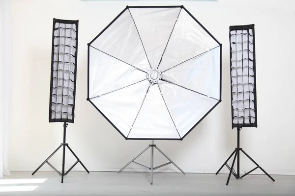 Flash on a white background in the Photo Studio equipment