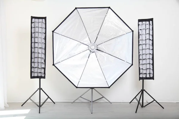 Flash on a white background in the Photo Studio equipment