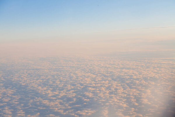 clouds at sunset from the plane in the sky landscape