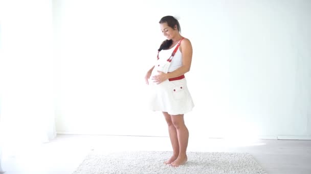 Emotions happy pregnant woman before childbirth — Stock Video