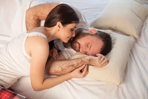 Girl wakes up in the morning after sleeping husband in bedroom 1 — Stock Photo, Image