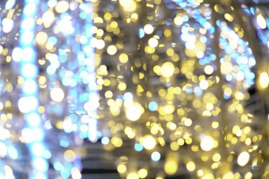 Yeni yıl için yan Noel ışıkları çelenk arka planı