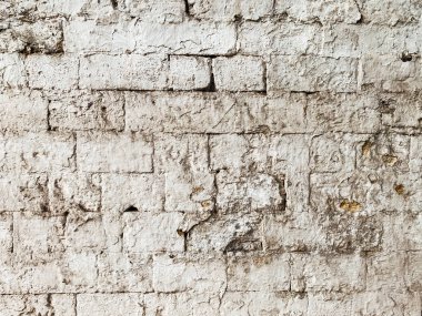 Arkaplan olarak eski taş duvar yapısı
