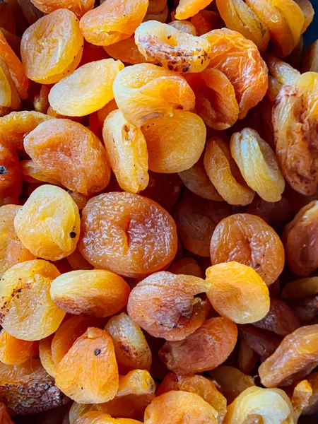 Spousta sladké sušené meruňkové ovoce pro stravování na pozadí — Stock fotografie