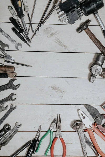 Construction hammers screwdriver repair tool pliers on the board — Stock Photo, Image