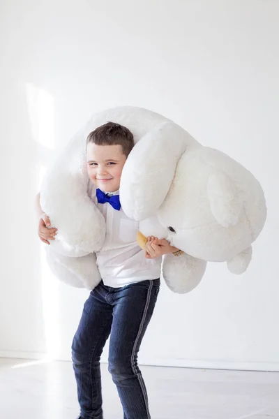 Boy with soft polar bear toy gift