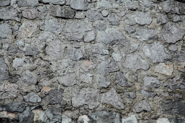 Stary kamienny mur kamienna konstrukcja w tle — Zdjęcie stockowe