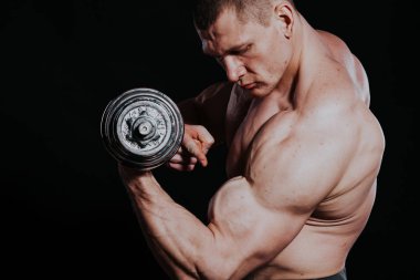 Spor atlet vücut geliştirmeci inşa kas halter