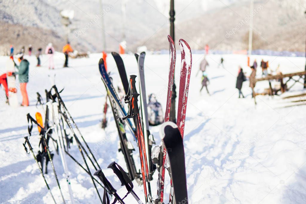 skis and Snowboards on the background of the ski resort vacation