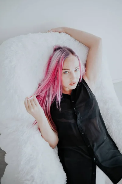 Portrait of beautiful fashionable woman pink hair