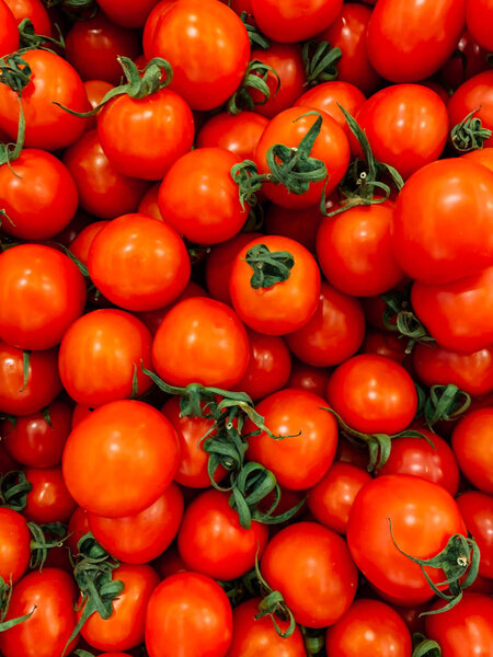 lots of red ripe tomato for eating like a background