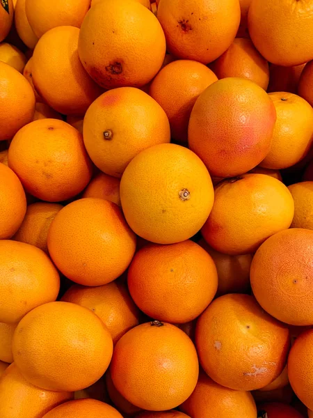 Muita fruta laranja madura para comer como pano de fundo — Fotografia de Stock