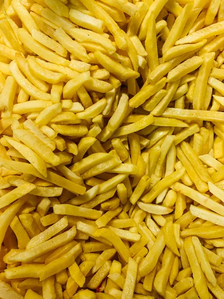 Un sacco di deliziose patatine fritte per mangiare come sfondo — Foto Stock