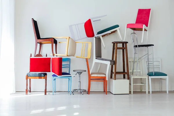 Many Different Chairs Stand Top Each Other Interior Empty White — Stock Photo, Image