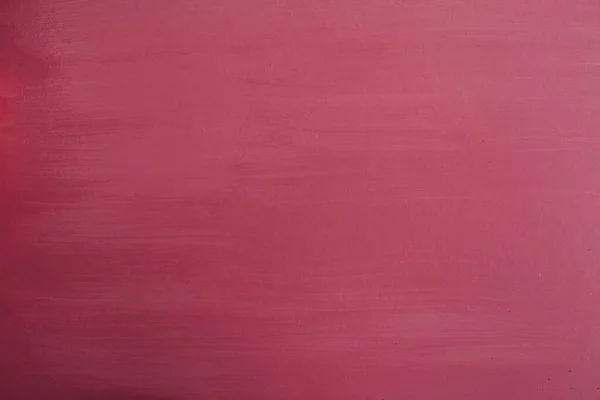 Wand aus zerbröckelter bordeauxroter Farbe als Hintergrund — Stockfoto