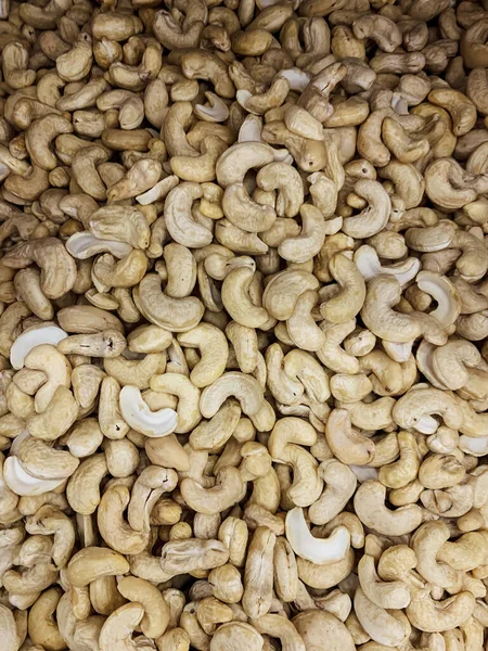 Spousta ořechů pro vaření jako pozadí — Stock fotografie