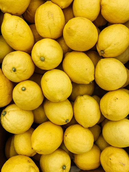 Lotes de limão amarelo maduro para cozinhar fundo — Fotografia de Stock