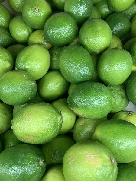 Un sacco di lime verde maturo per cucinare il cibo di sfondo — Foto Stock