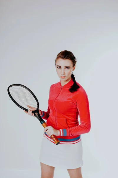 Tenis raket spor oynarken kız — Stok fotoğraf